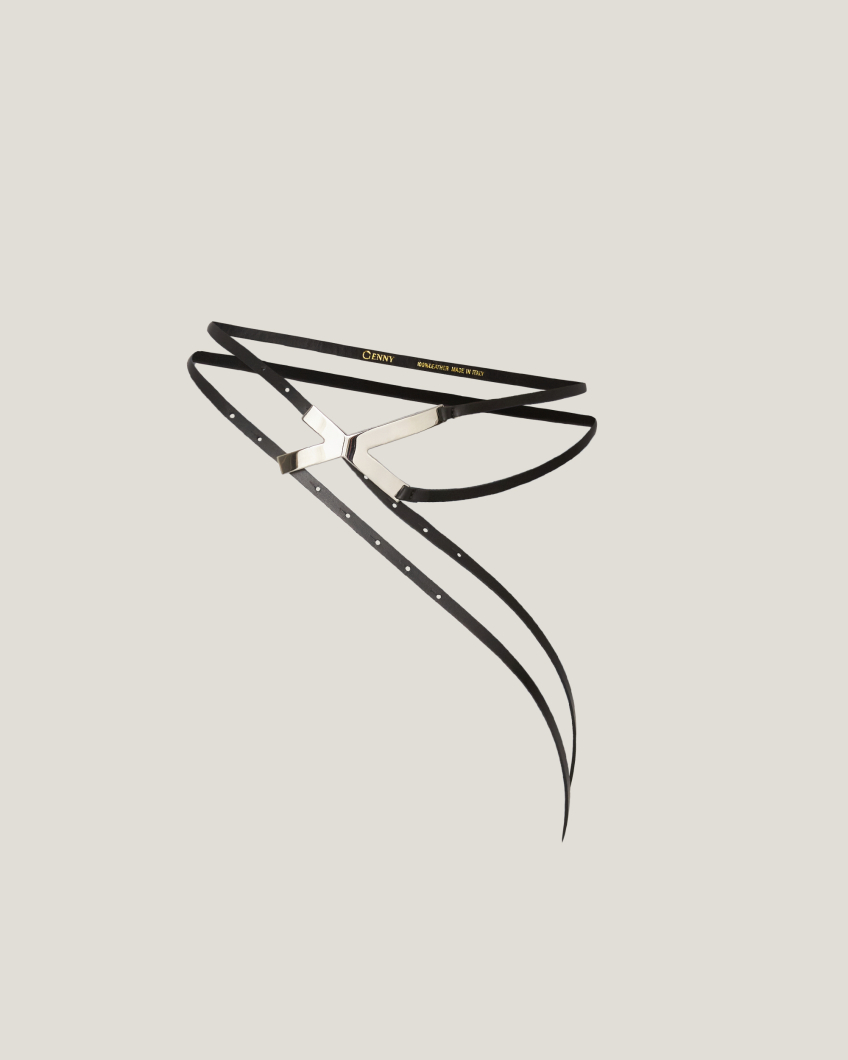 Asymmetrical belt with X buckle