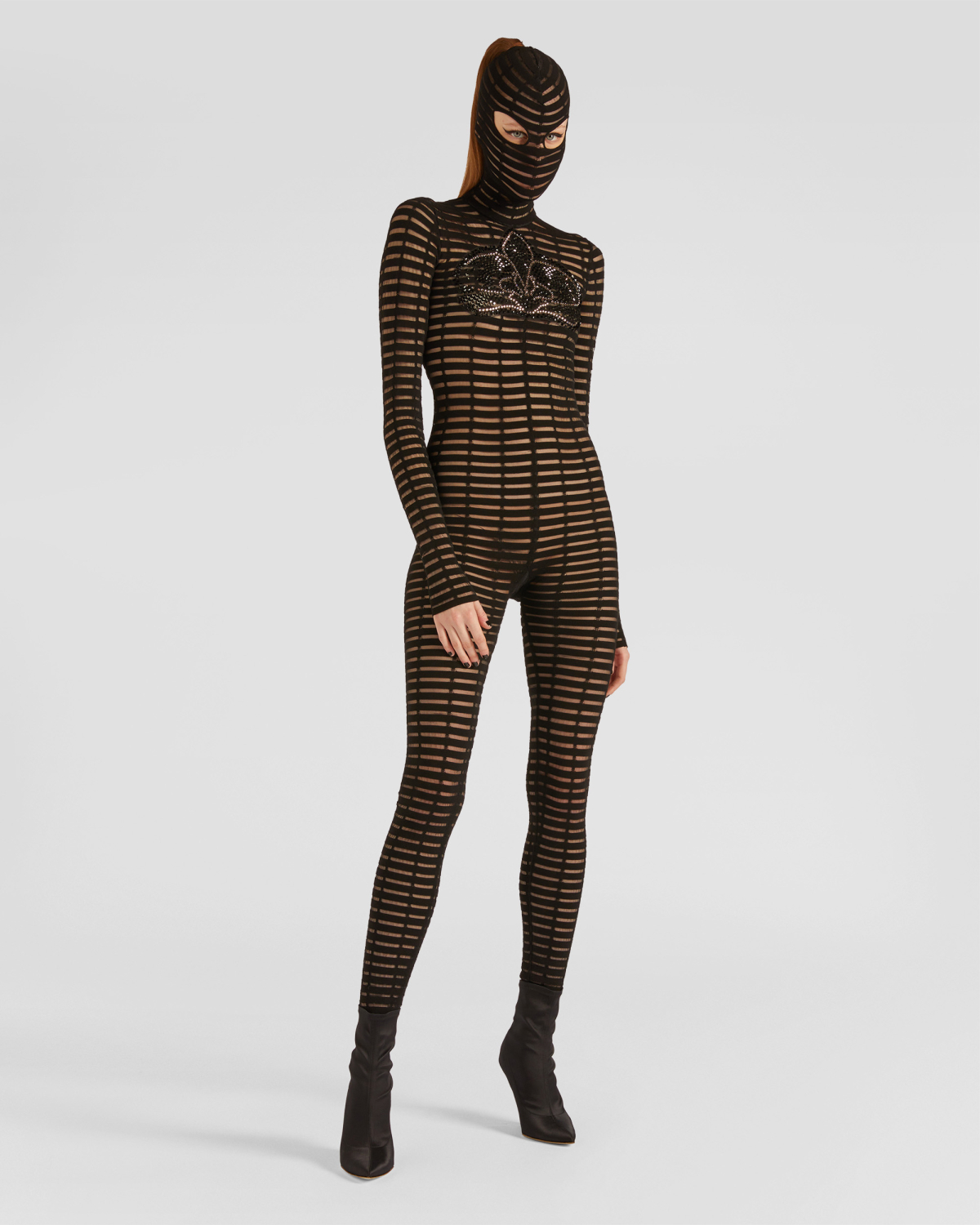 One-piece jumpsuit with a hood | hide_category | Genny