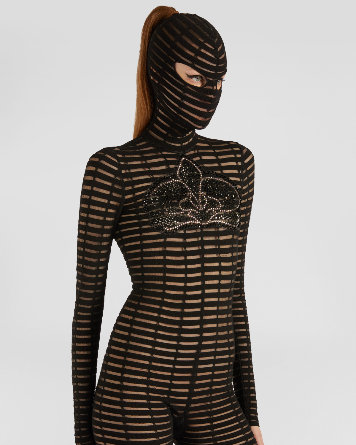 One-piece jumpsuit with a hood | hide_category | Genny