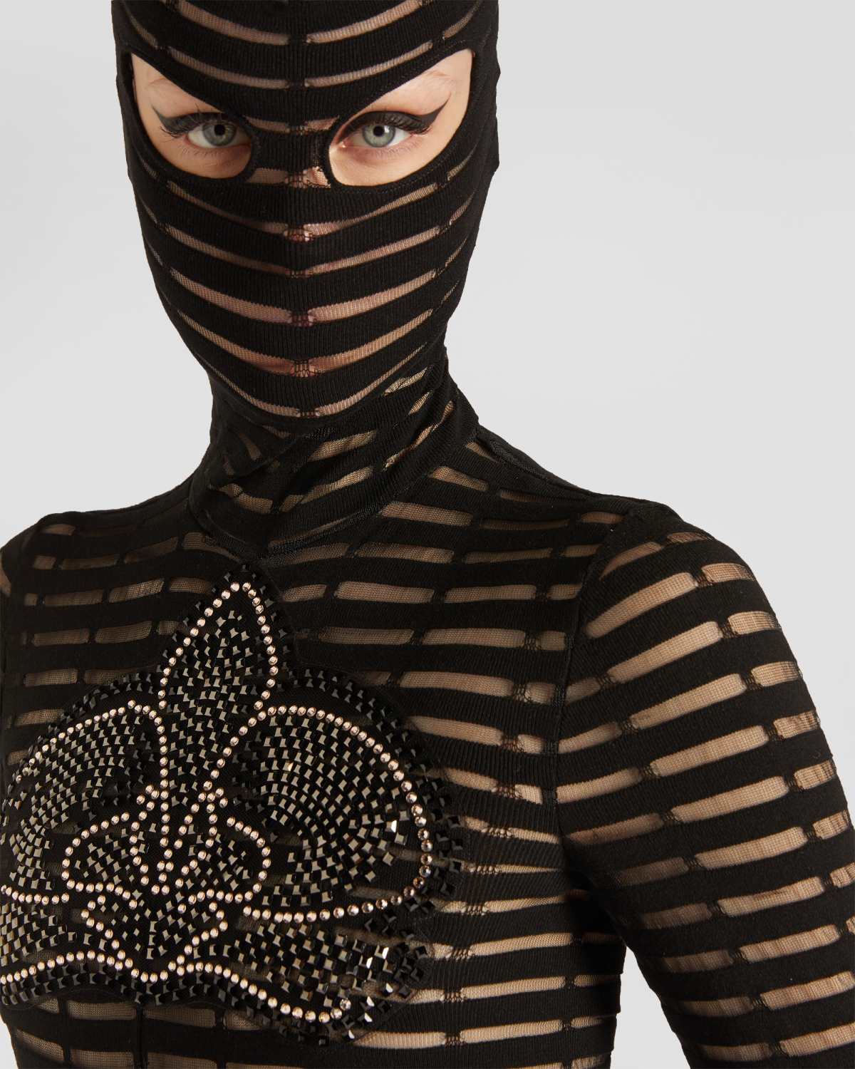 One-piece jumpsuit with a hood | hide_category | Genny