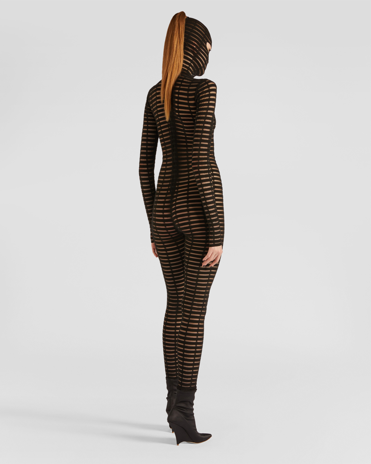 One-piece jumpsuit with a hood | hide_category | Genny