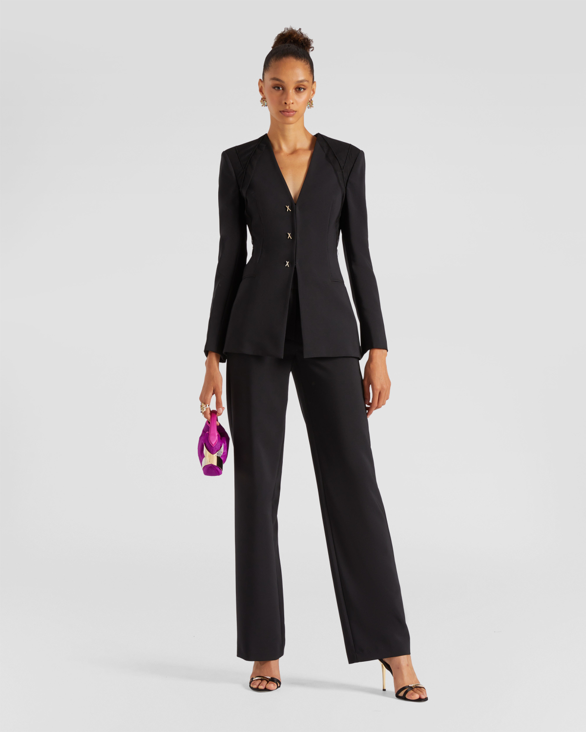 High-waisted tailored pants | | Genny