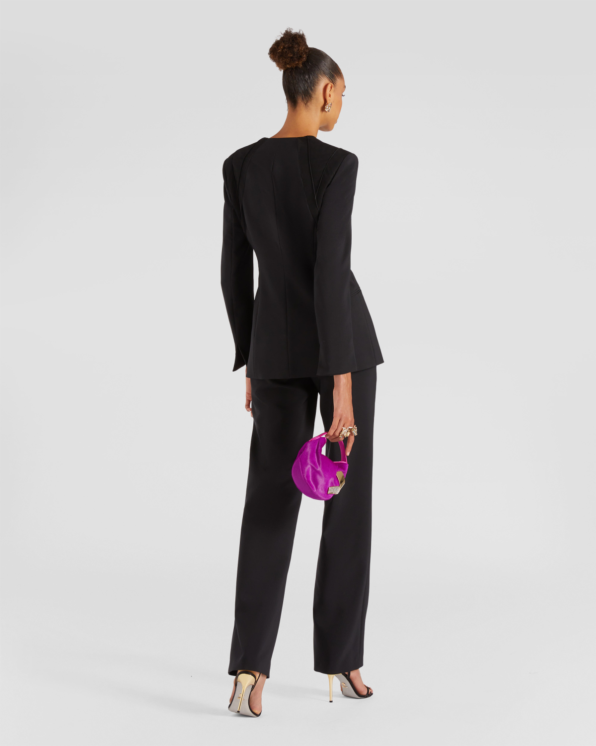 High-waisted tailored pants | | Genny