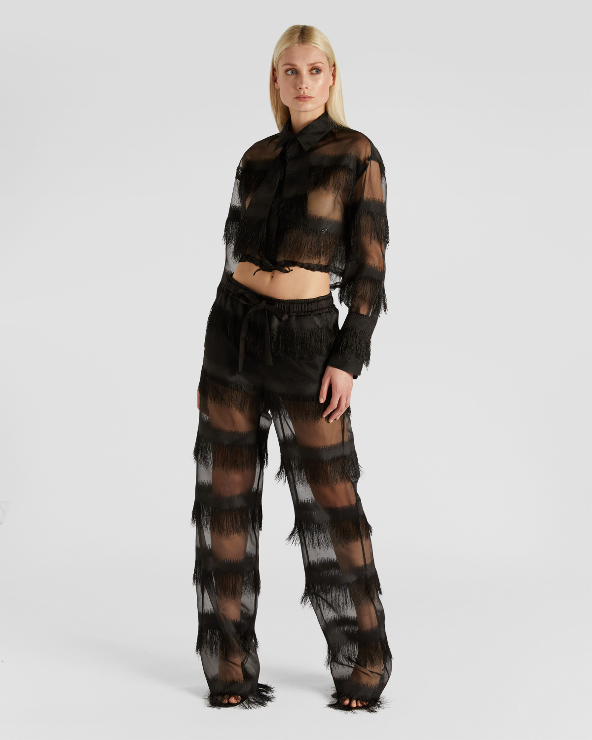 Pants with contrasting fabric | | Genny