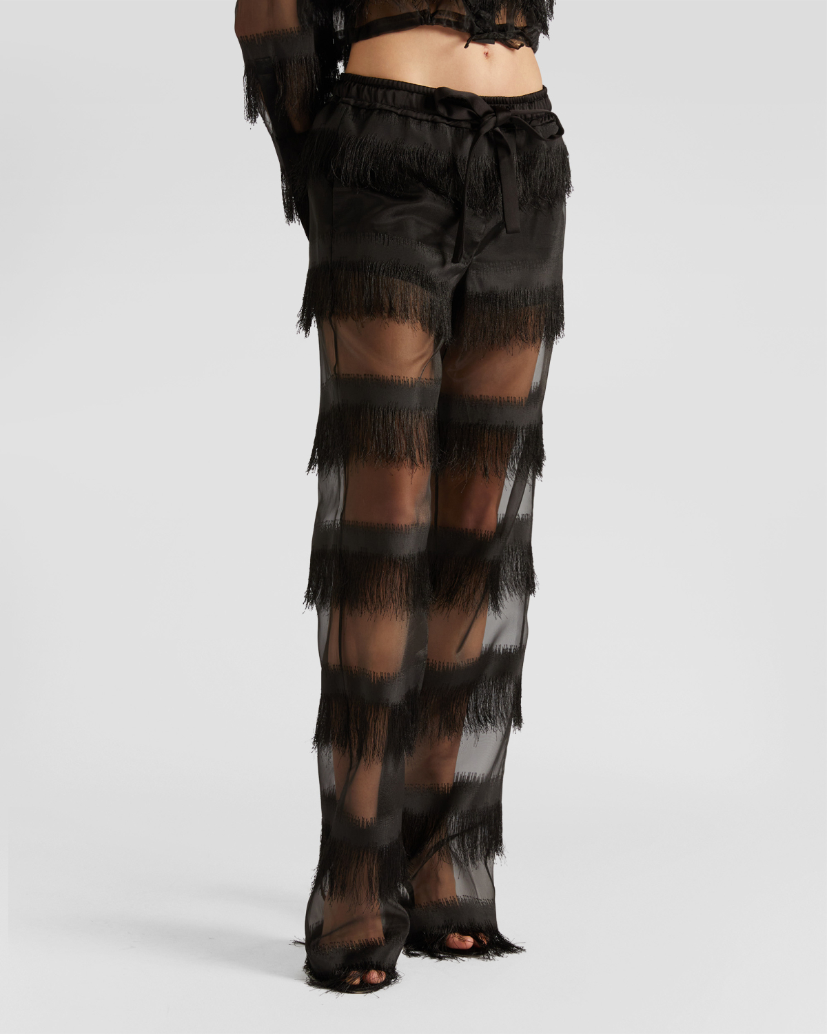 Pants with contrasting fabric | | Genny