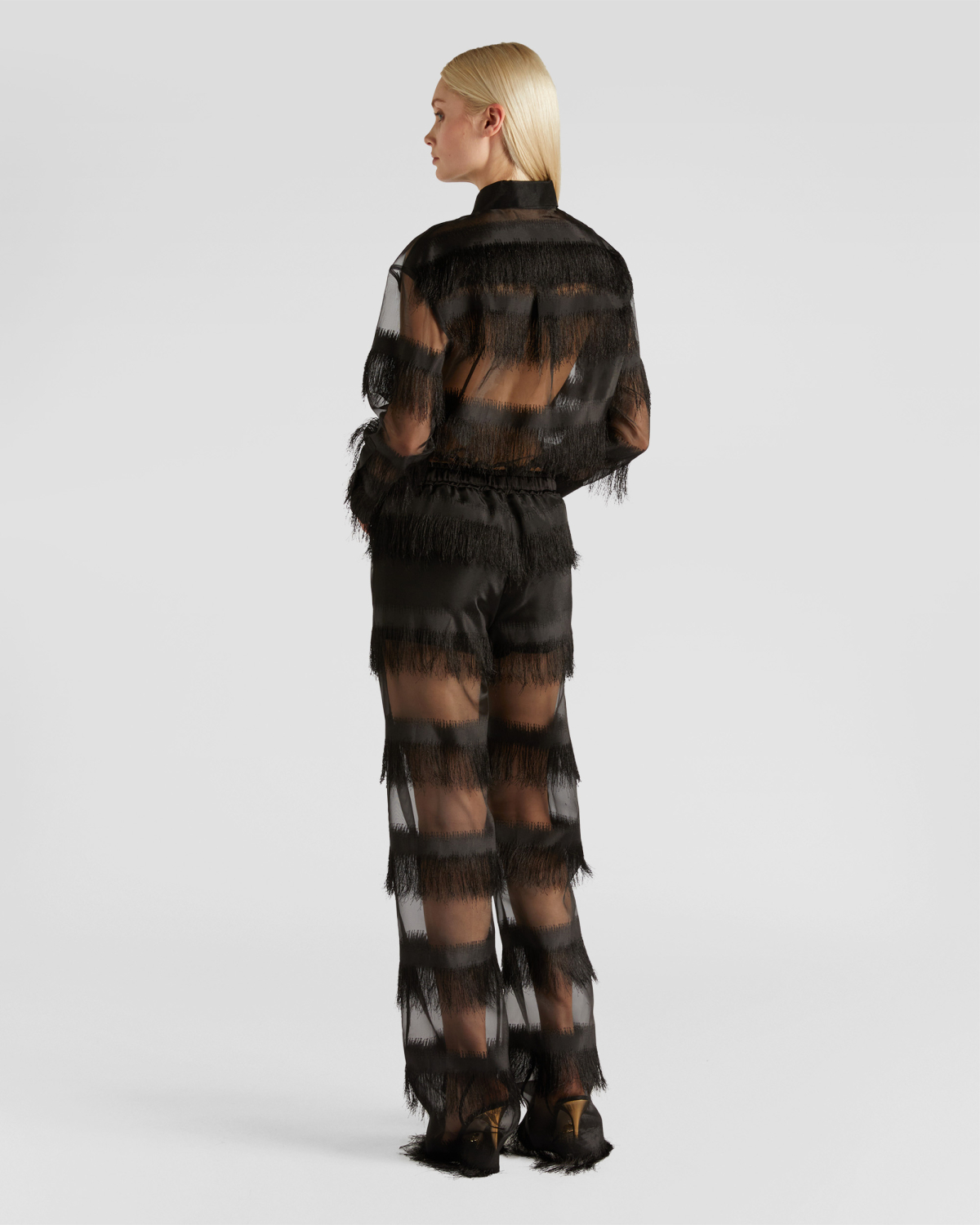 Pants with contrasting fabric | | Genny