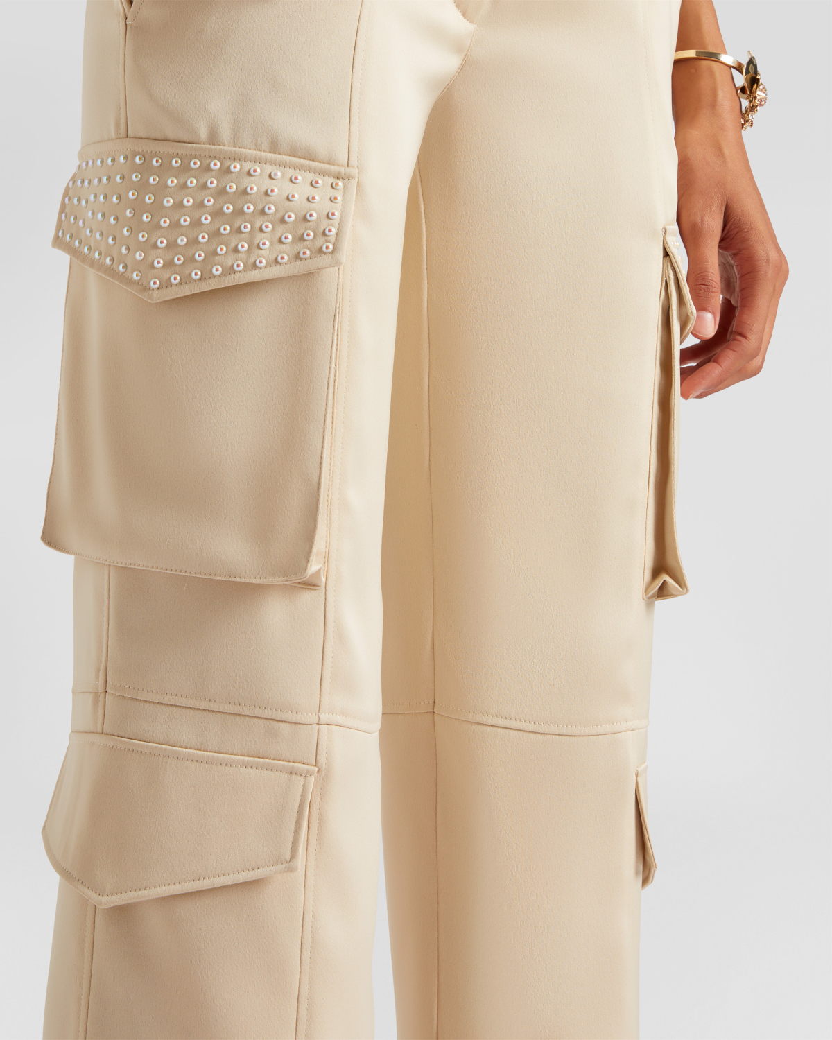 Cargo pants with pearls | | Genny