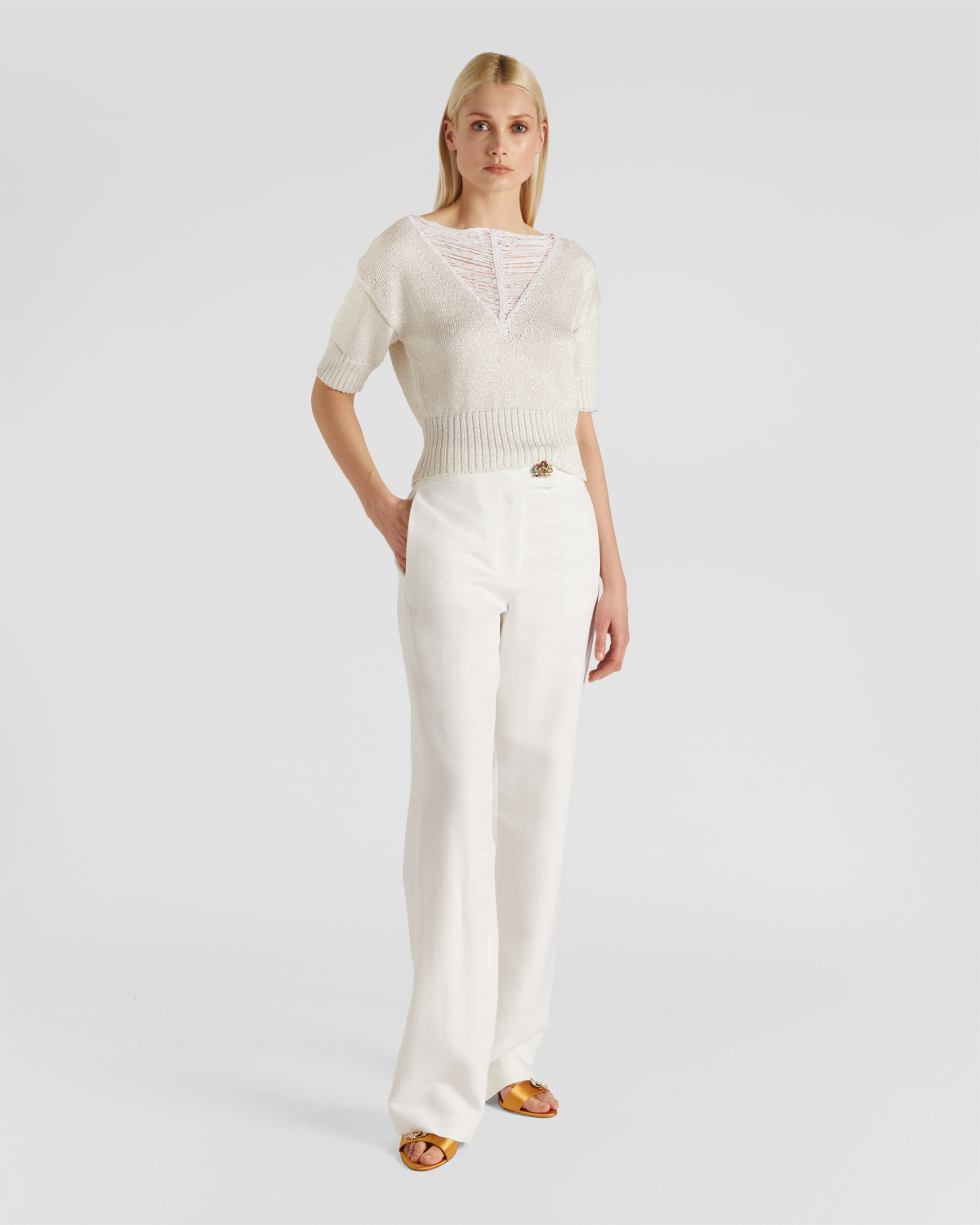 V-neck sweater | | Genny