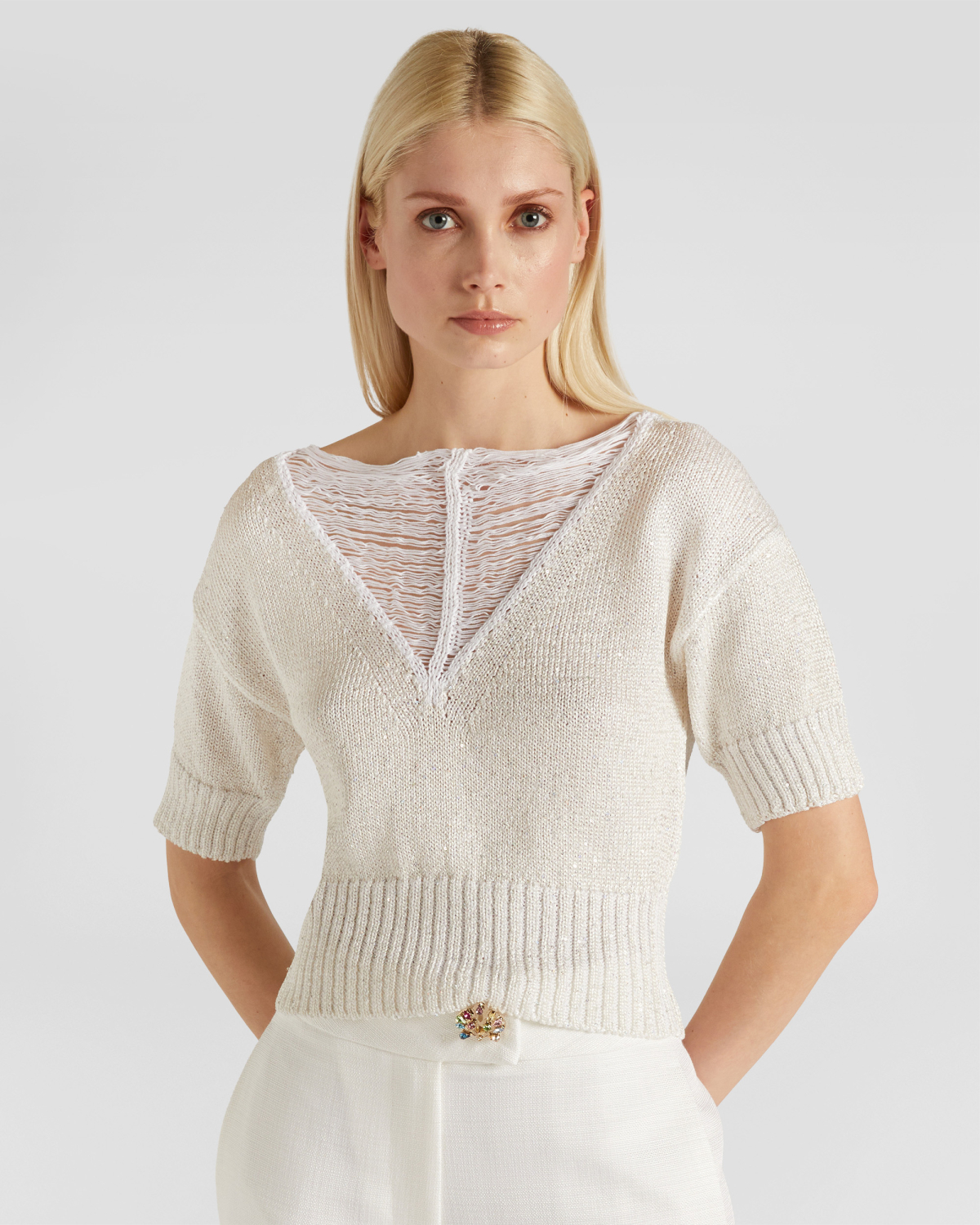 V-neck sweater | | Genny