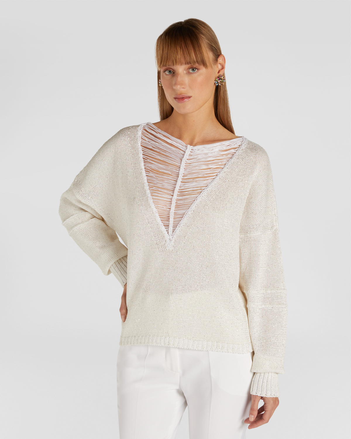 V-neck sweater | | Genny