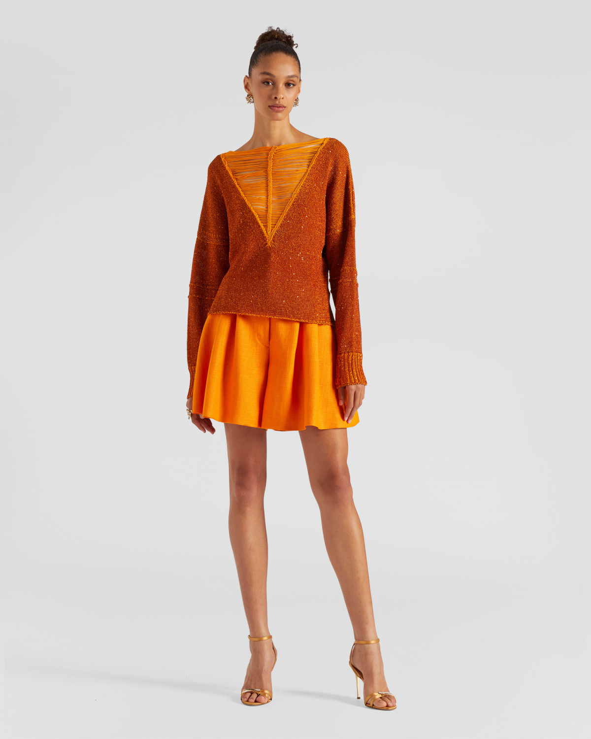 V-neck sweater | | Genny