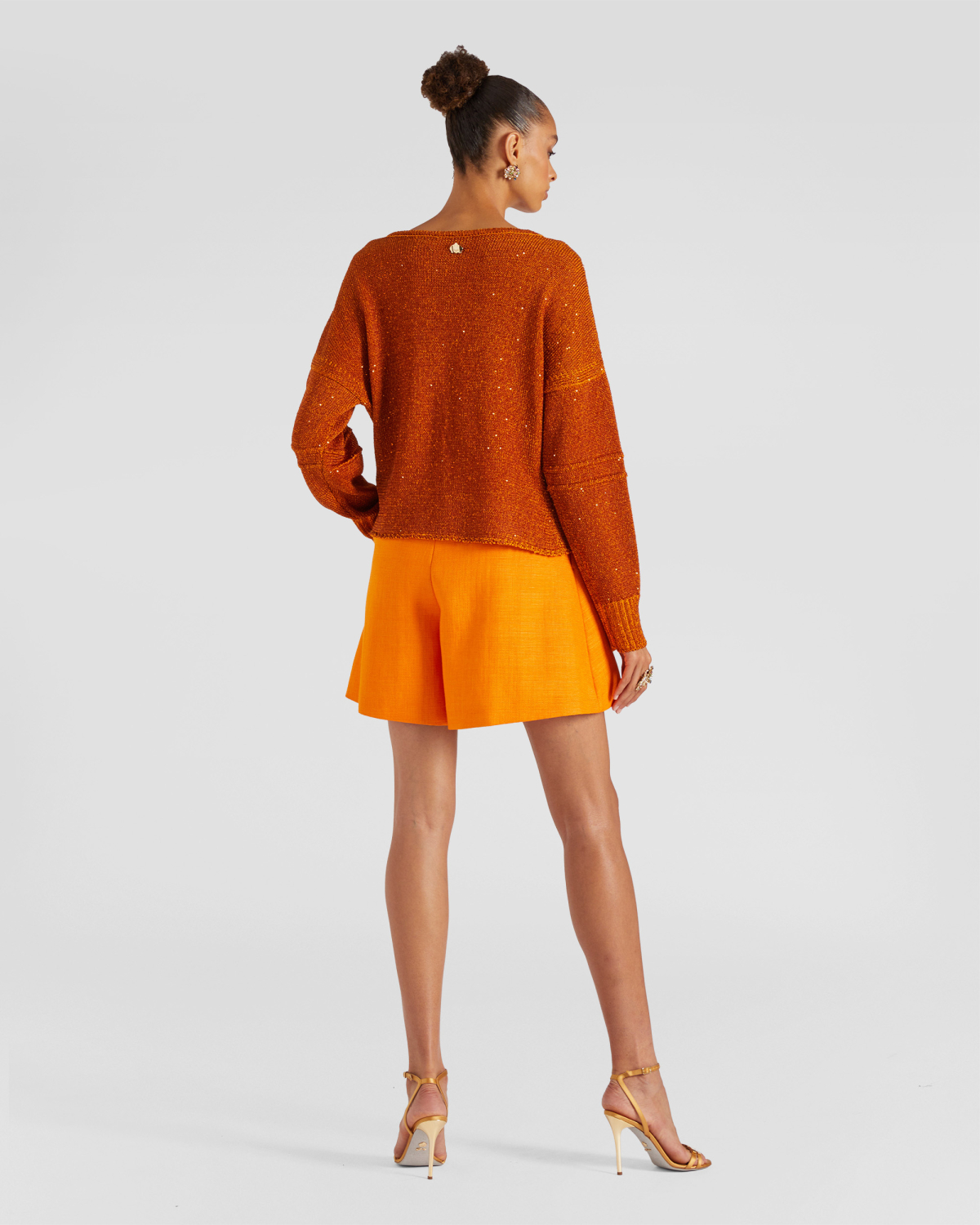V-neck sweater | | Genny