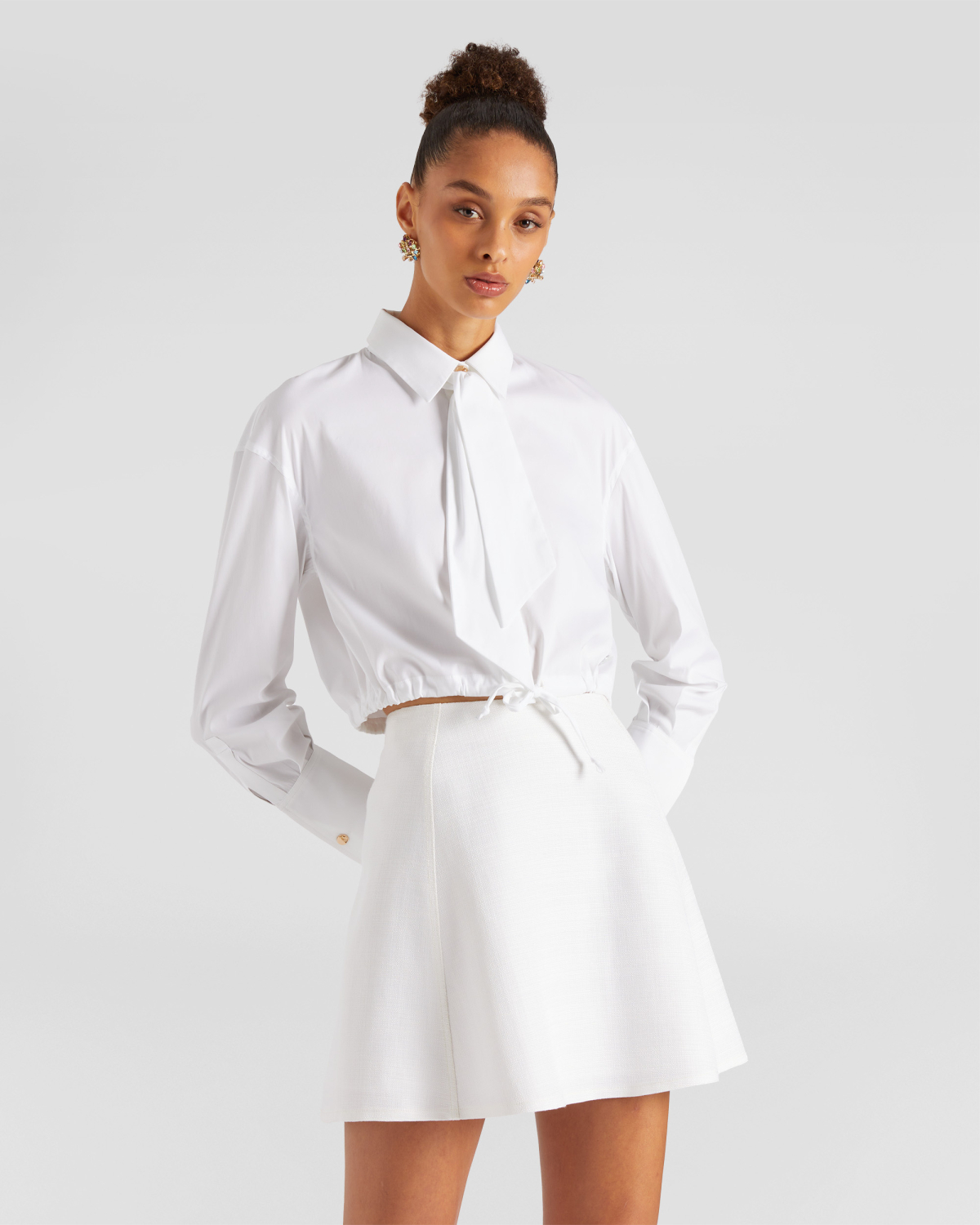 Shirt with a drawstring | | Genny