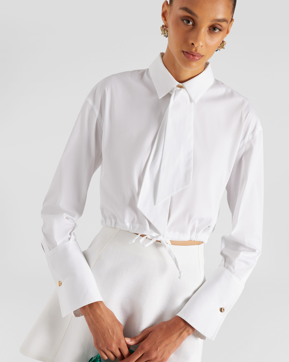 Shirt with a drawstring | | Genny