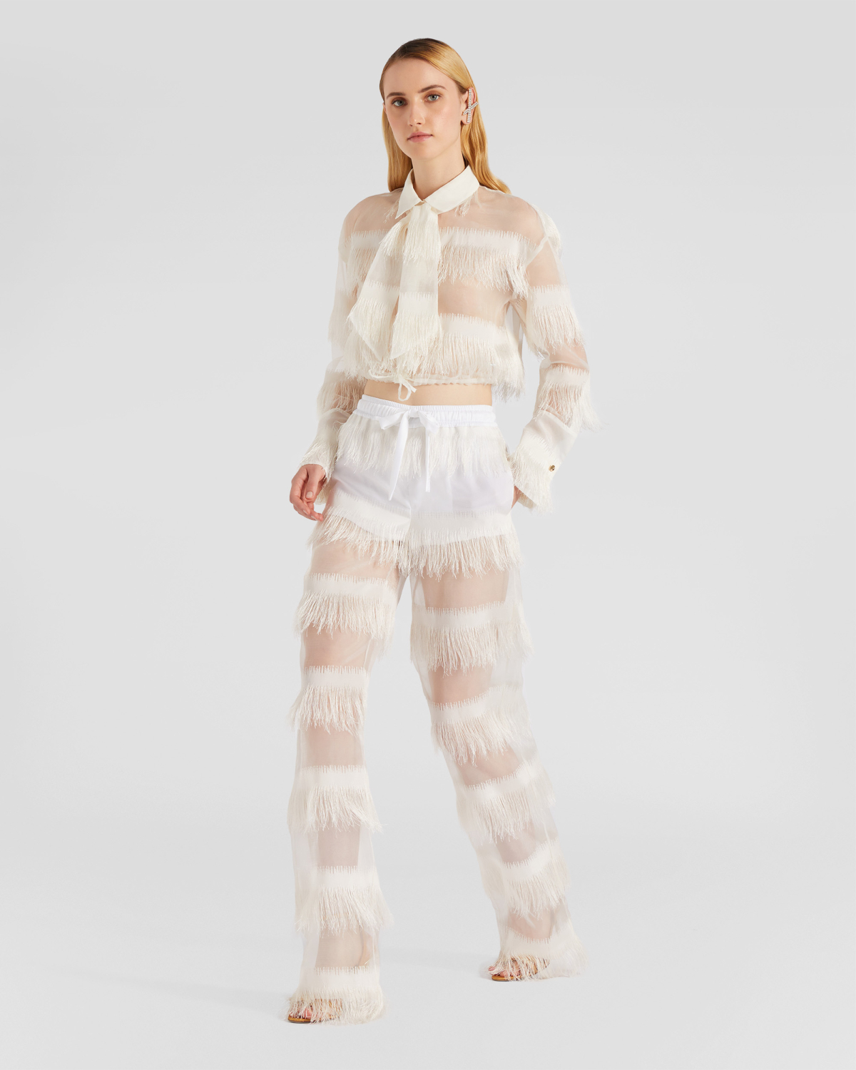 Fringed shirt with lavallière | | Genny