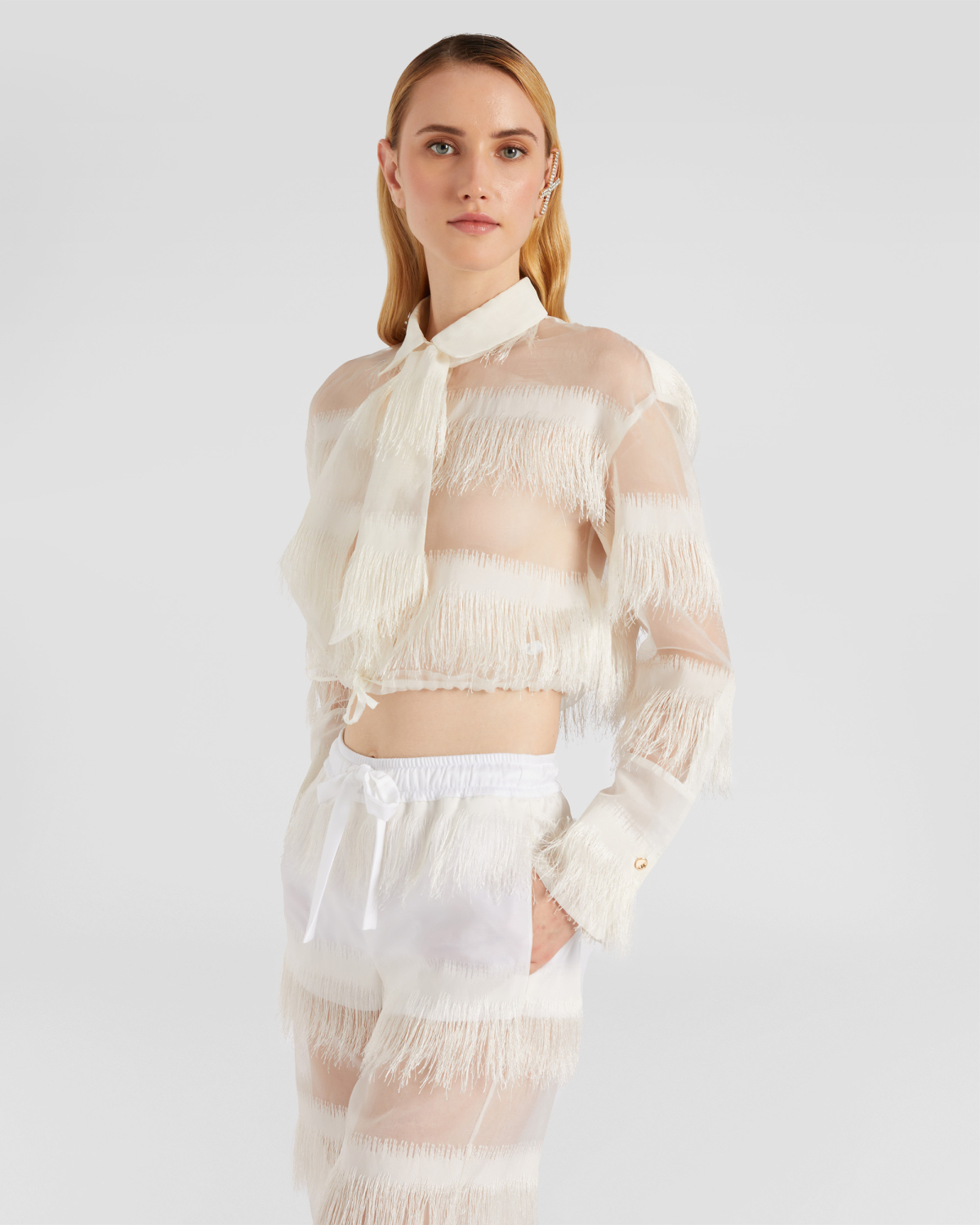 Fringed shirt with lavallière | | Genny