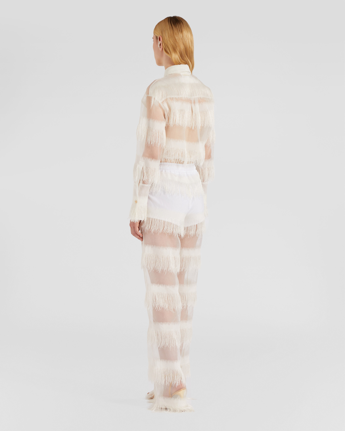 Fringed shirt with lavallière | | Genny