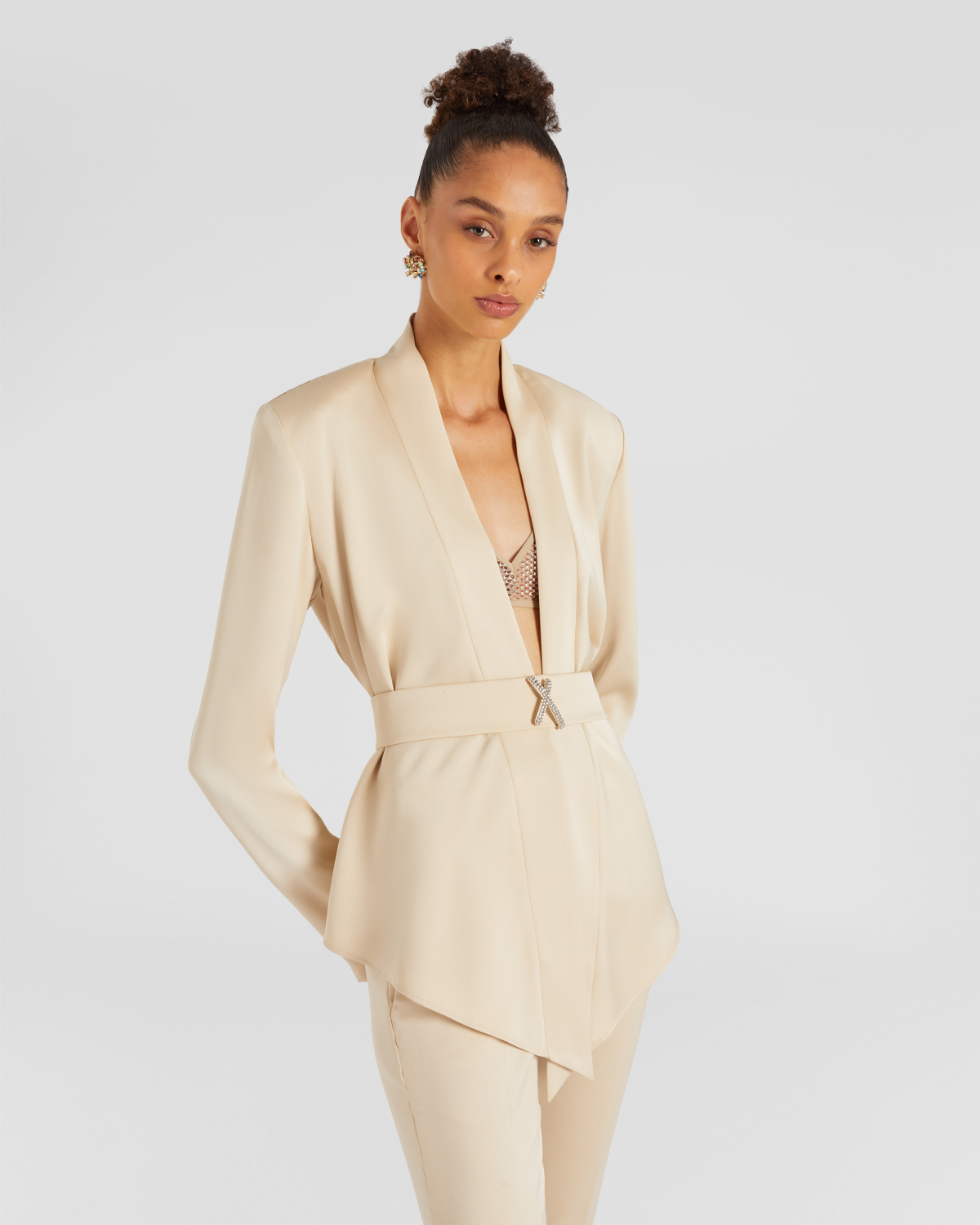 Loose jacket with belt | | Genny