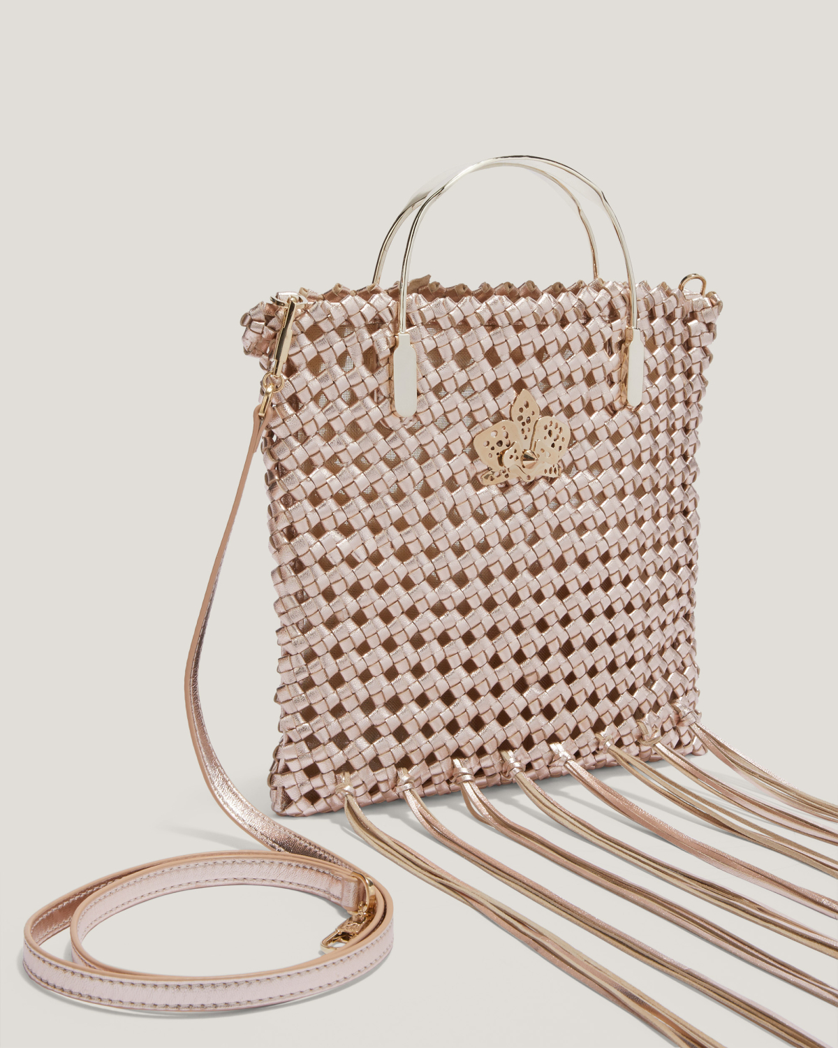 Woven leather bag with fringes | hide_category | Genny