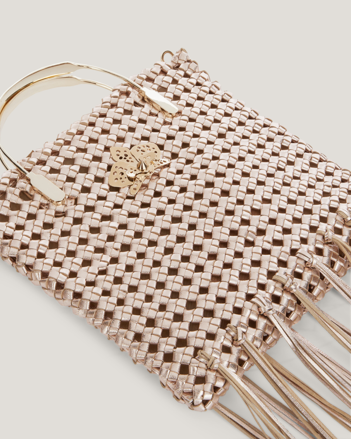 Woven leather bag with fringes | hide_category | Genny
