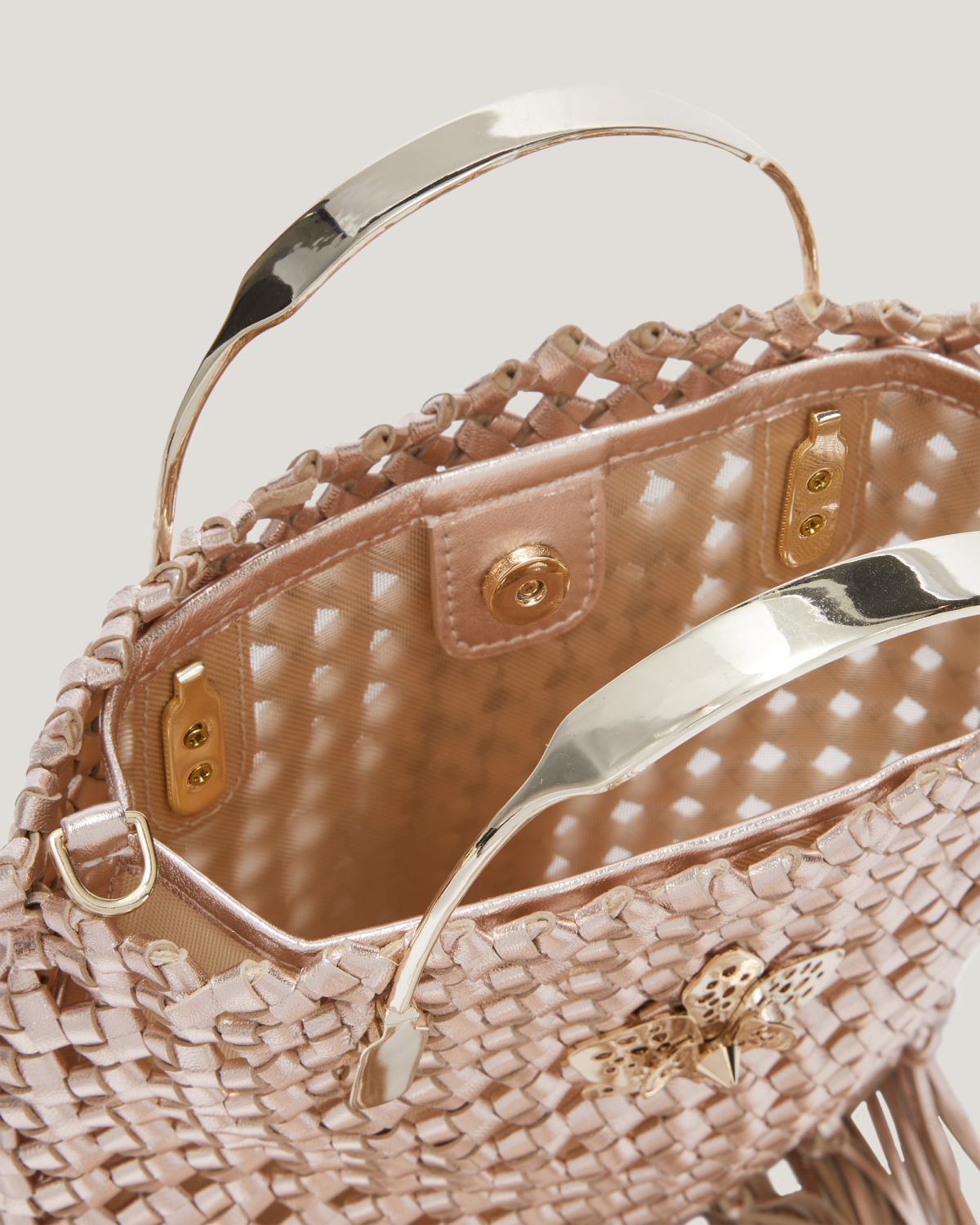 Woven leather bag with fringes | hide_category | Genny