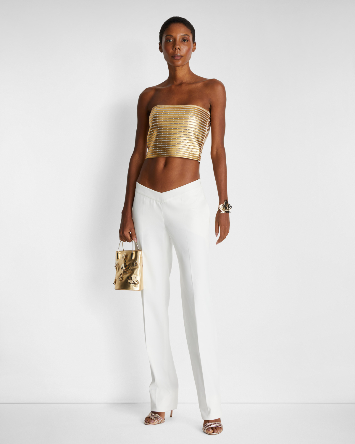 Cotton pants with V-strap | | Genny