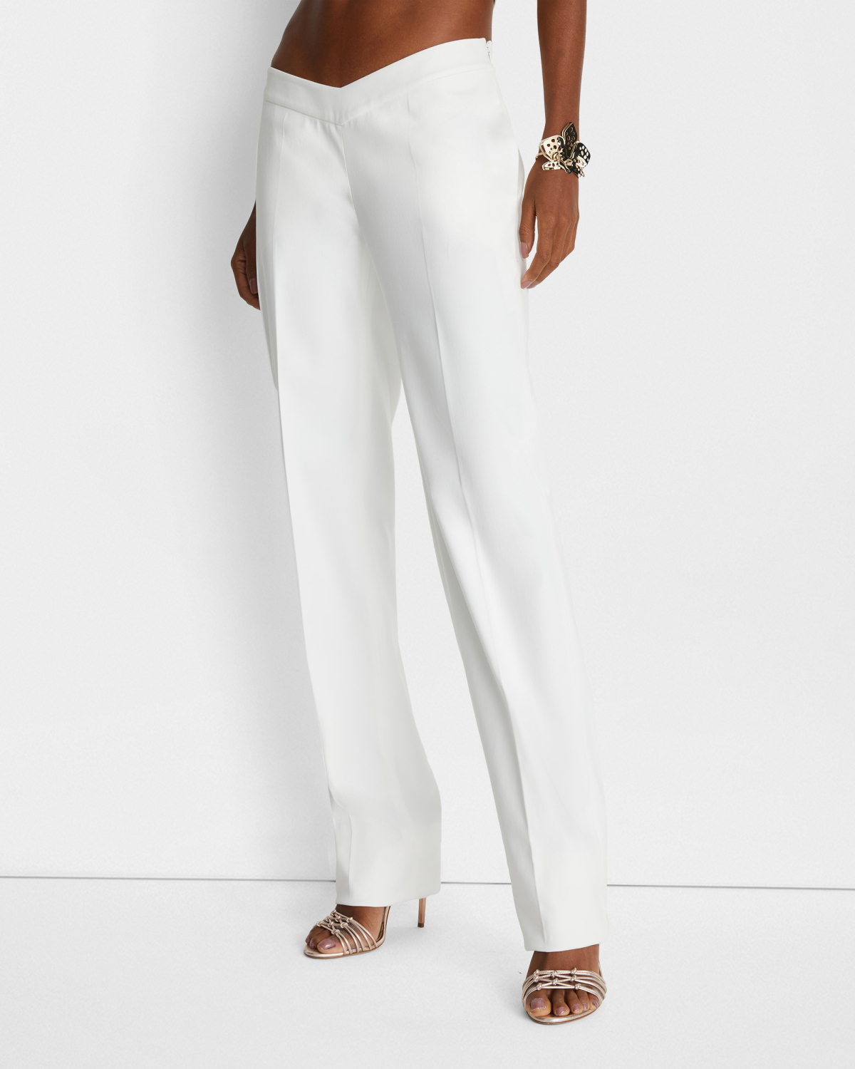 Cotton pants with V-strap | | Genny