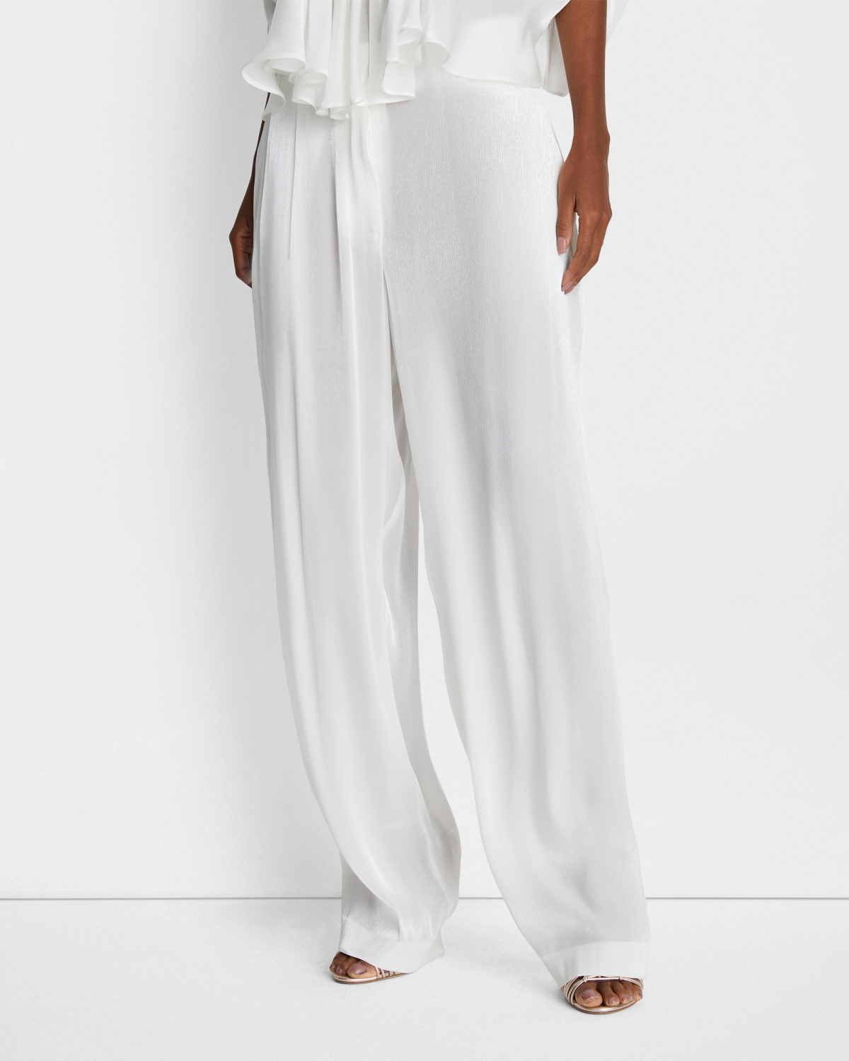 Wide-leg shiny effect pants | | Genny