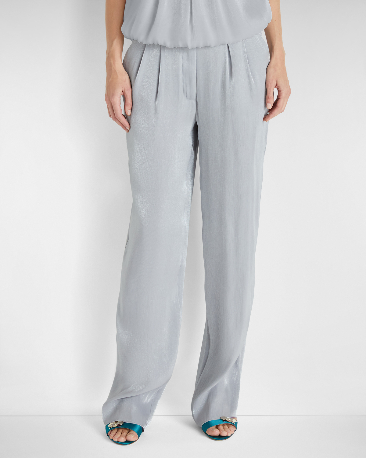 Wide-leg shiny effect pants | | Genny