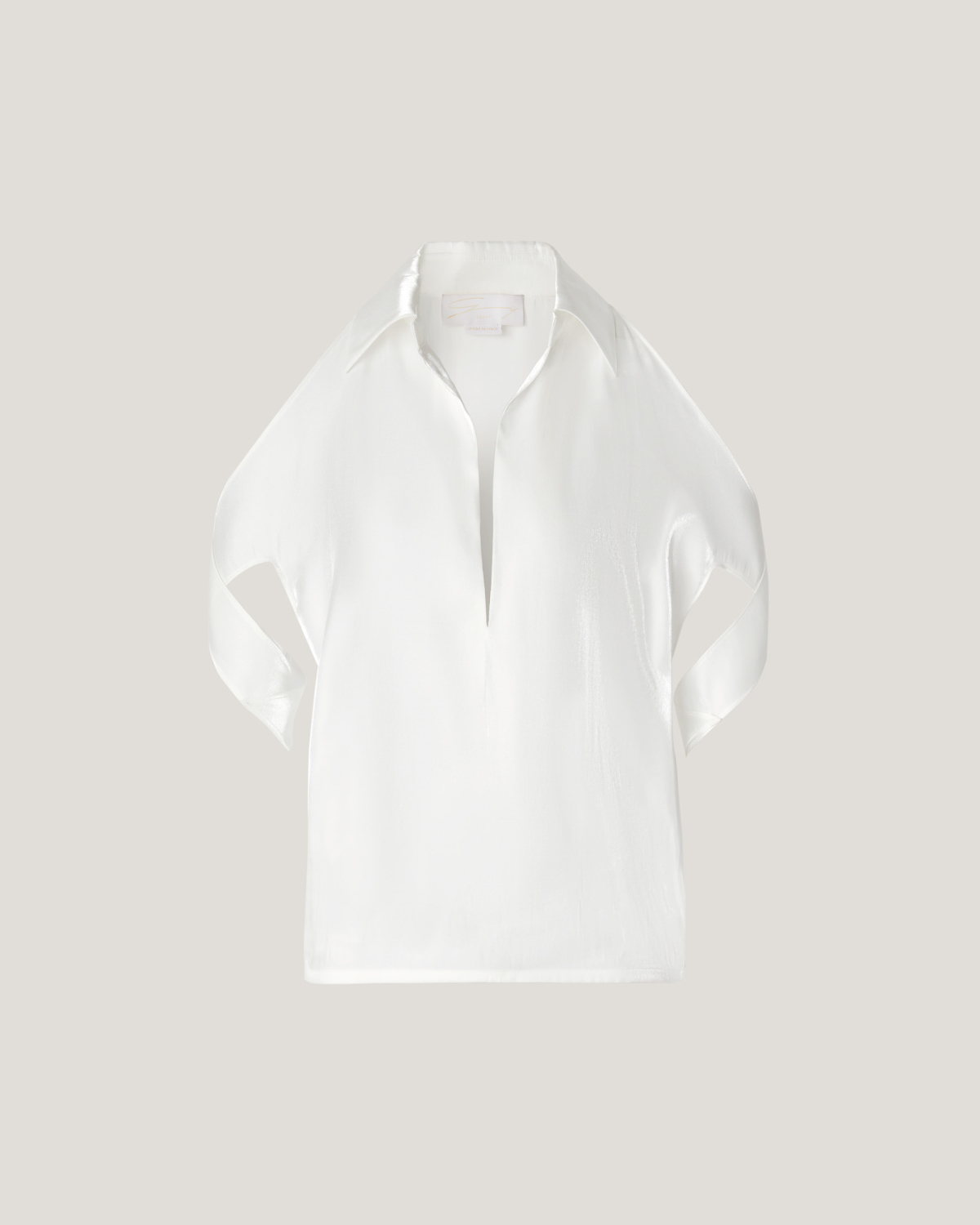 Blouse with X-pattern sleeves | | Genny