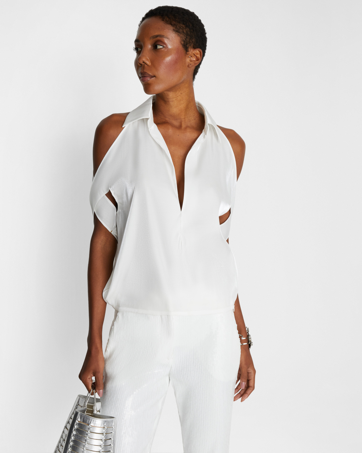 Blouse with X-pattern sleeves | | Genny