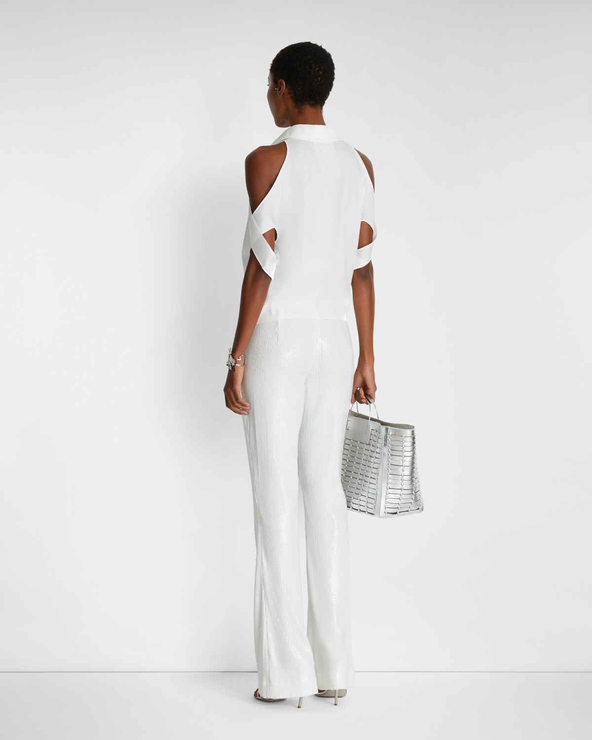 Blouse with X-pattern sleeves | | Genny