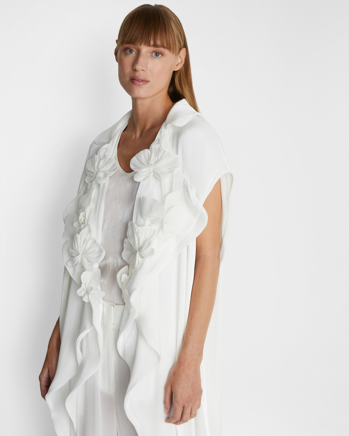Sleeveless trench coat | | Genny
