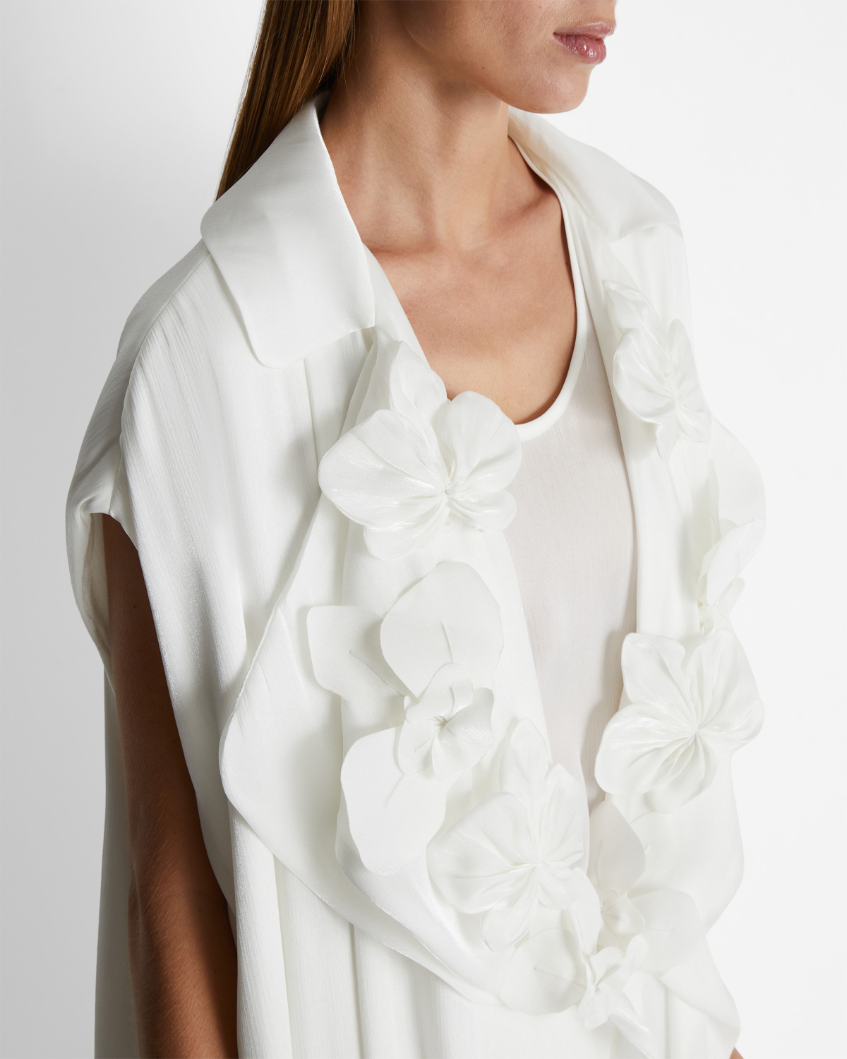 Sleeveless trench coat | | Genny