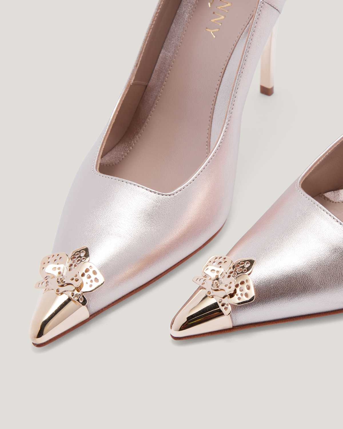 Laminated leather Orchid pumps | | Genny