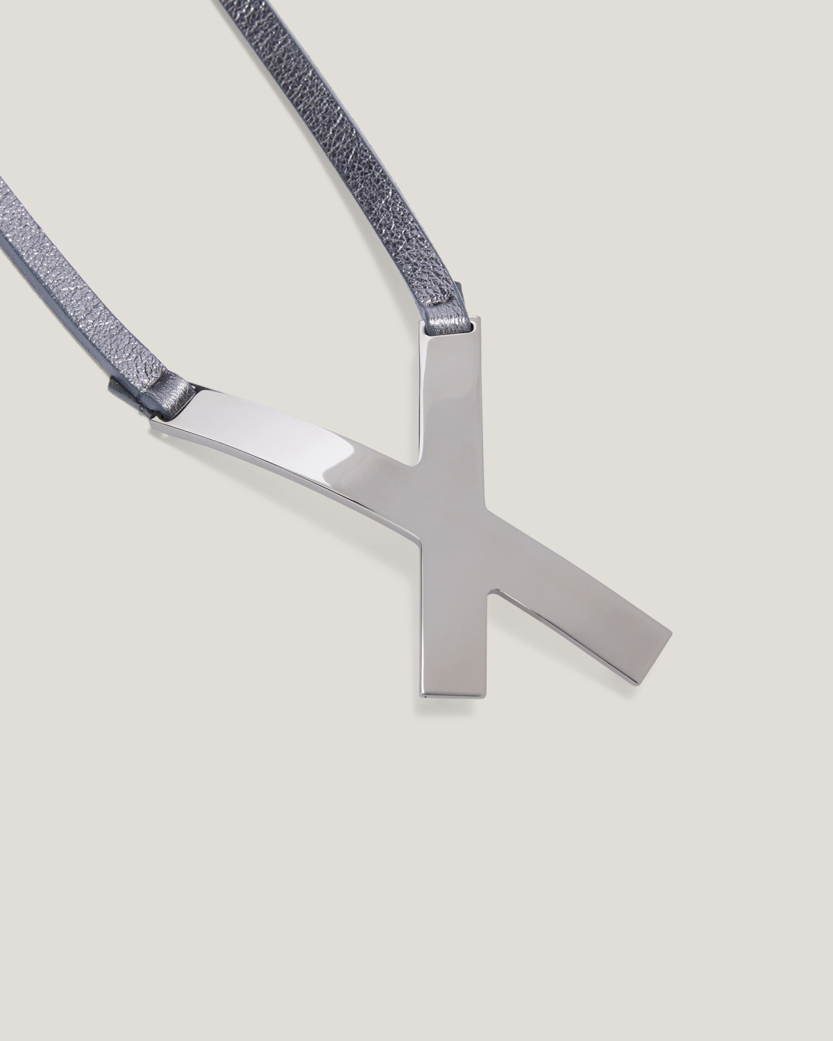 Asymmetrical belt with X buckle | Belts, Fall Winter 2025, Accessories | Genny