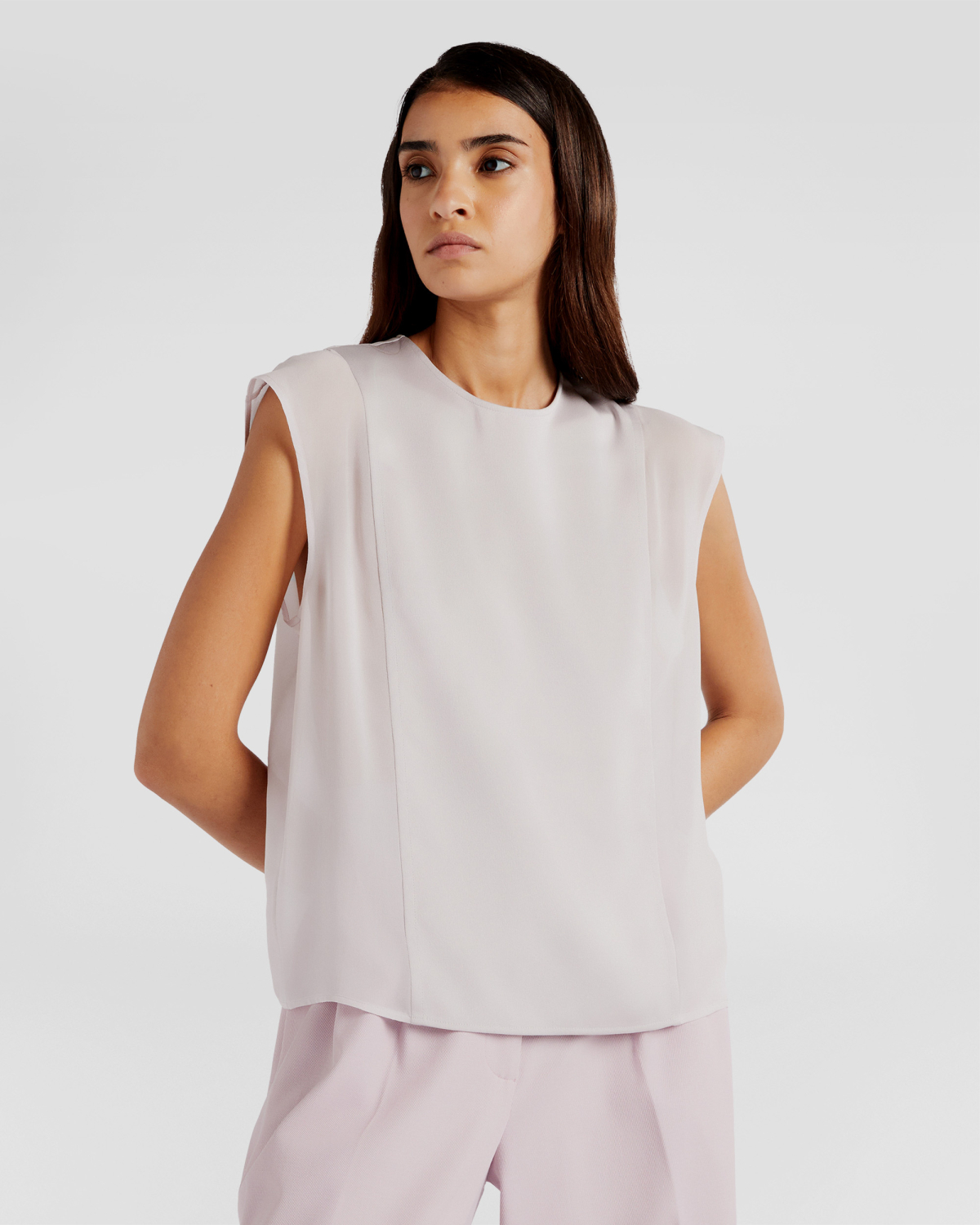 Top with sheer silk details | | Genny