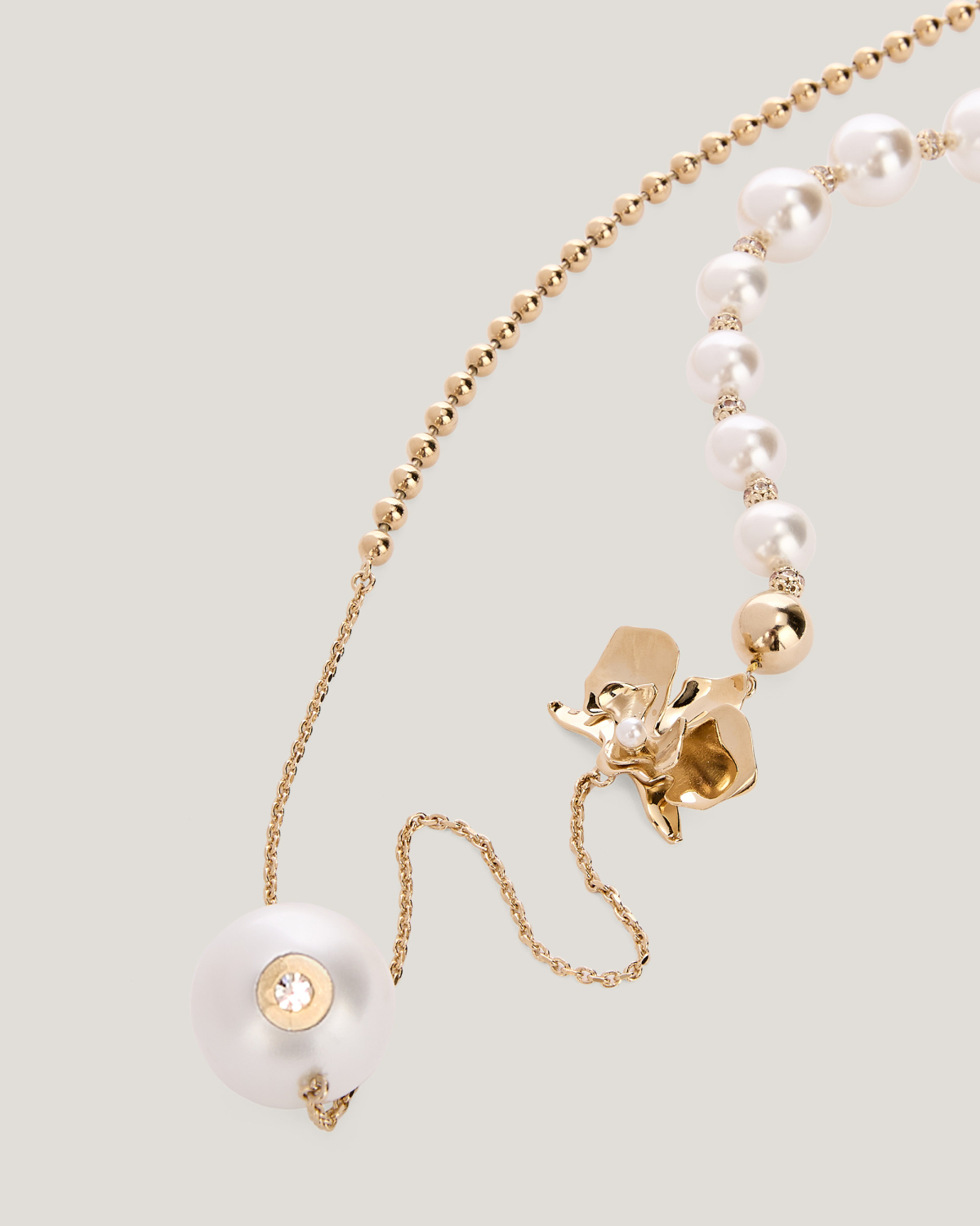 Long necklace with pearls and orchid detail | Valentine's Gifts, Spring Summer 2025 Collection, Mother’s Day Gifts, Jewelry, Necklaces, Spring Summer 2025, Ceremony Outfit, New Arrivals, Accessories | Genny