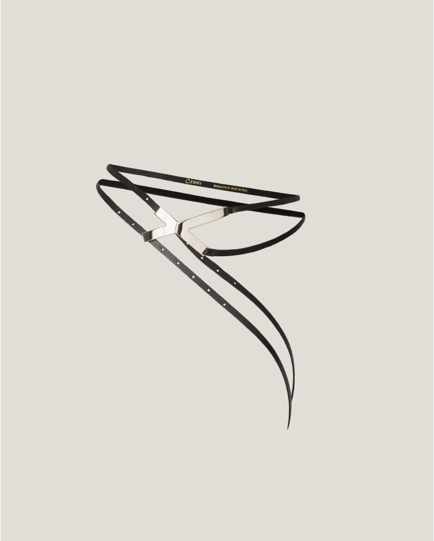 Asymmetrical belt with X buckle
