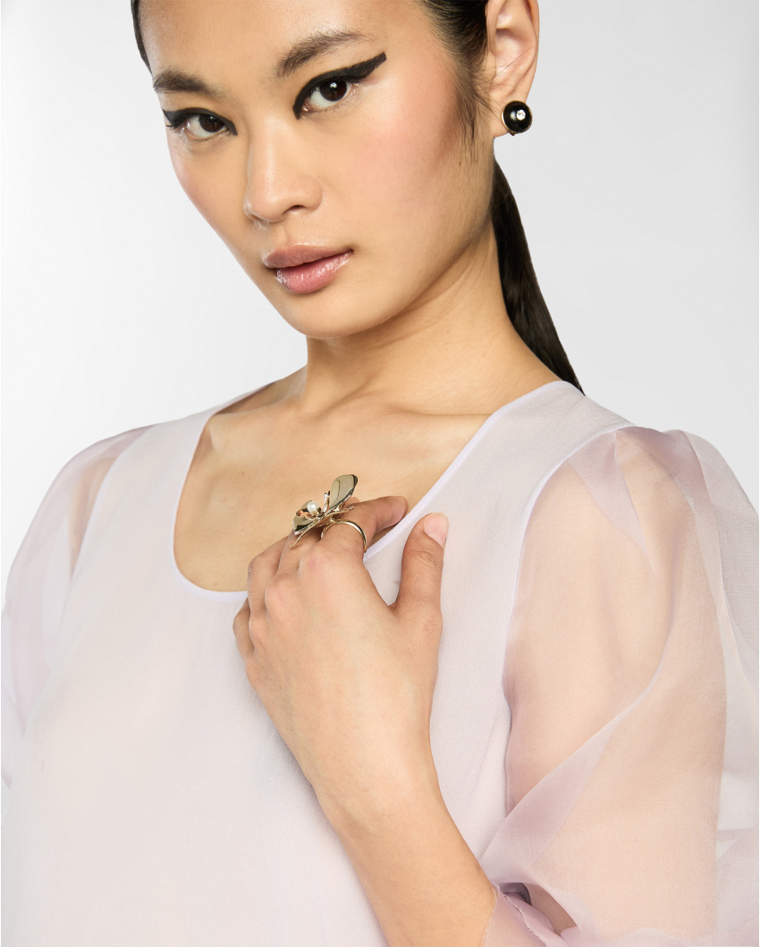 Metal ring with orchid and pearl